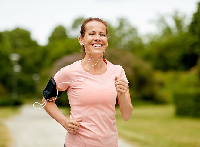 Sporty woman jogging with headphones